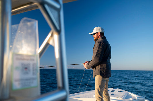 Man wearing shacket while fishing